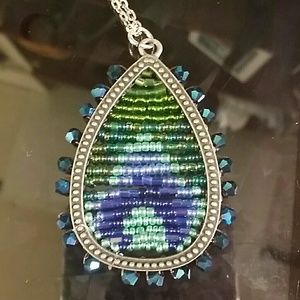 Beautiful handmade beaded peacock feather necklace